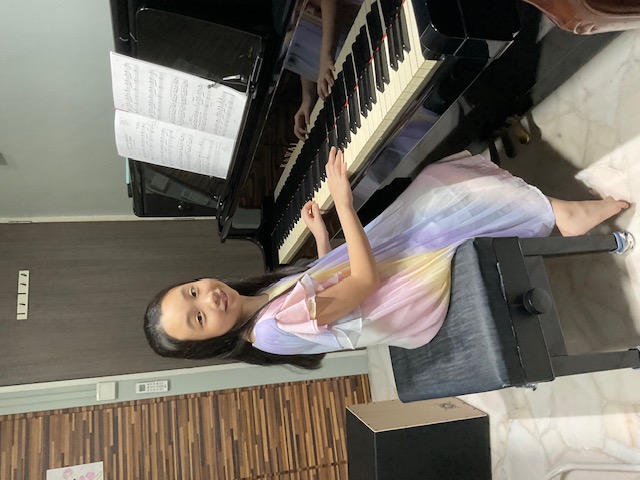 Piano lesson in progress
